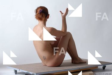 lucrecia sitting 52