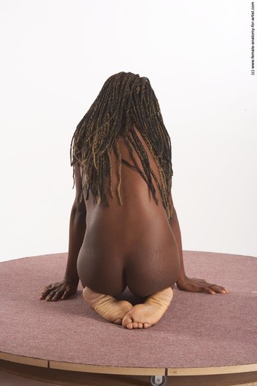 Nude Woman Black Perspective distortion Slim dreadlocks black Pinup