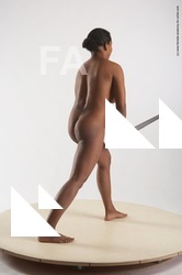 Nude Fighting with sword Woman Black Standing poses - ALL Slim medium black Standing poses - simple Pinup