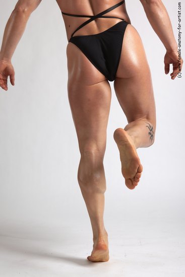 Swimsuit Woman White Detailed photos Muscular medium brown Academic
