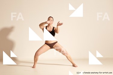 Underwear Martial art Woman White Moving poses Average long colored Dynamic poses Academic