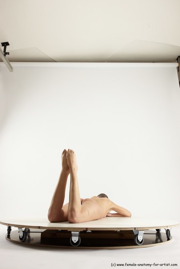 Nude Woman White Laying poses - ALL Slim Laying poses - on stomach bald Multi angle poses Pinup