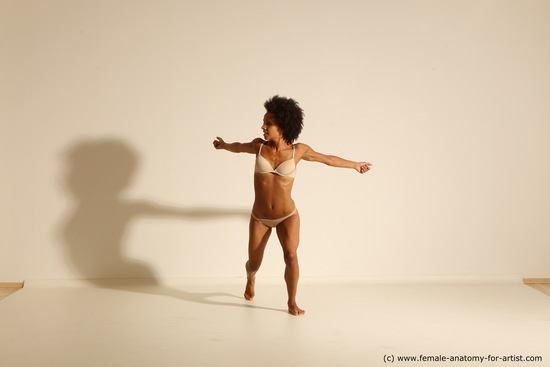 Underwear Gymnastic poses Woman Black Moving poses Slim medium brown Dynamic poses Academic