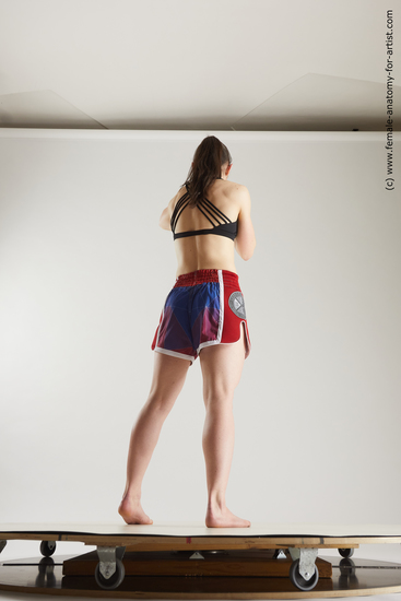 Sportswear Woman White Slim long brown Fighting Multi angle poses Academic