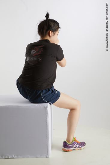 Sportswear Fighting with gun Woman Asian Sitting poses - ALL Average medium black Sitting poses - simple Standard Photoshoot Academic