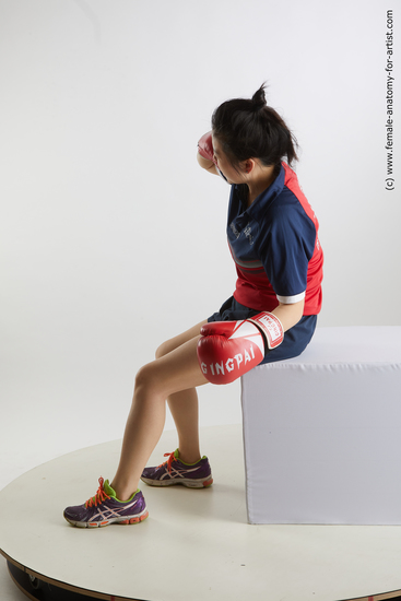 Sportswear Woman Asian Sitting poses - ALL Average medium black Sitting poses - simple Fighting Standard Photoshoot Academic