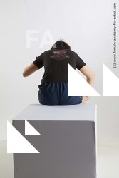 Sportswear Fighting with gun Woman Asian Sitting poses - ALL Average medium black Sitting poses - simple Standard Photoshoot Academic