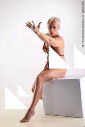 Swimsuit Woman Sitting poses - ALL Muscular short blond Sitting poses - simple Standard Photoshoot Academic