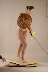 Nude Fighting with sword Woman White Standing poses - ALL Slim long brown Standing poses - simple Pinup