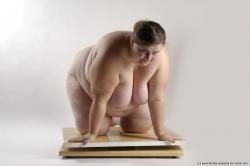 Nude Woman White Kneeling poses - ALL Overweight Kneeling poses - on both knees medium brown Pinup