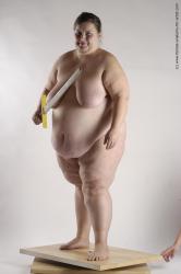 Nude Fighting with sword Woman White Standing poses - ALL Overweight medium brown Standing poses - simple Pinup