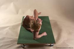 Nude Woman White Laying poses - ALL Muscular Laying poses - on back medium blond Pinup