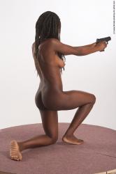 Nude Fighting with gun Woman Black Kneeling poses - ALL Slim Kneeling poses - on one knee dreadlocks black Pinup