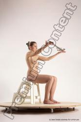 Nude Fighting with sword Woman White Sitting poses - ALL Slim short blond Sitting poses - simple Multi angle poses Pinup