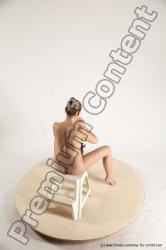 Nude Fighting with sword Woman White Sitting poses - ALL Slim short blond Sitting poses - simple Multi angle poses Pinup