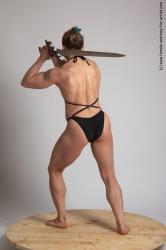 Swimsuit Fighting with sword Woman White Standing poses - ALL Muscular medium brown Standing poses - simple Academic