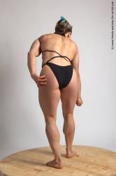 Swimsuit Woman White Standing poses - ALL Muscular medium brown Standing poses - simple Academic