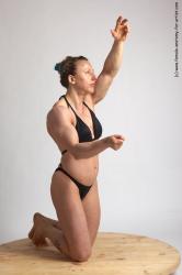 Swimsuit Woman White Kneeling poses - ALL Muscular Kneeling poses - on both knees medium brown Academic