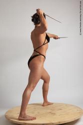 Swimsuit Fighting with knife Woman White Standing poses - ALL Muscular long brown Standing poses - simple Academic
