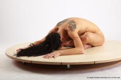 Nude Woman White Laying poses - ALL Slim Laying poses - on stomach dreadlocks black Pinup