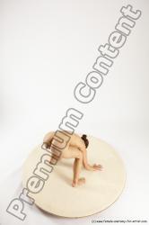 Nude Gymnastic poses Woman White Standing poses - ALL Athletic Standing poses - bend over medium brown Multi angle poses Pinup