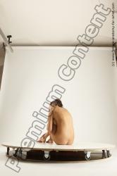 Sitting reference poses of Della