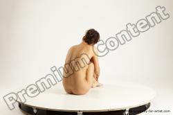 Sitting reference poses of Della