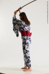 Casual Fighting with sword Woman Asian Slim long black Multi angle poses Academic