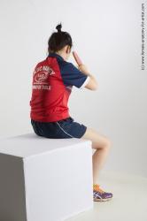 Sportswear Woman Asian Sitting poses - ALL Average medium black Sitting poses - simple Standard Photoshoot Academic
