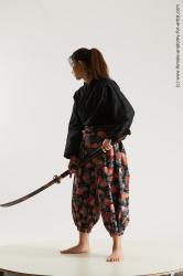 Casual Fighting with sword Woman Asian Standing poses - ALL Slim long black Standing poses - simple Multi angle poses Academic