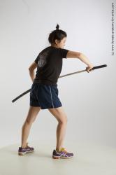 Sportswear Fighting with sword Woman Black Standing poses - ALL Average medium black Standing poses - simple Standard Photoshoot Academic