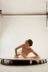 Nude Woman White Laying poses - ALL Underweight Laying poses - on stomach medium brown Multi angle poses Pinup
