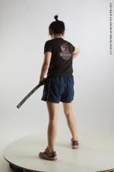 Sportswear Fighting with sword Woman Asian Standing poses - ALL Average medium black Standard Photoshoot Academic