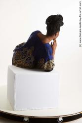 Lying reference poses Dina Moses